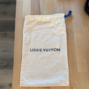 Louis Vuitton Cream Drawstring Pouch with Navy Logo and Blue drawstring